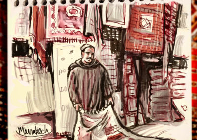 Rug merchant near the Jemaa El-Fna market square, Marrakech, Morocco