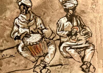 Gwana musicians in Khamlia, Morocco playing a 3-stringed percussive lute, drum and metal castanets.